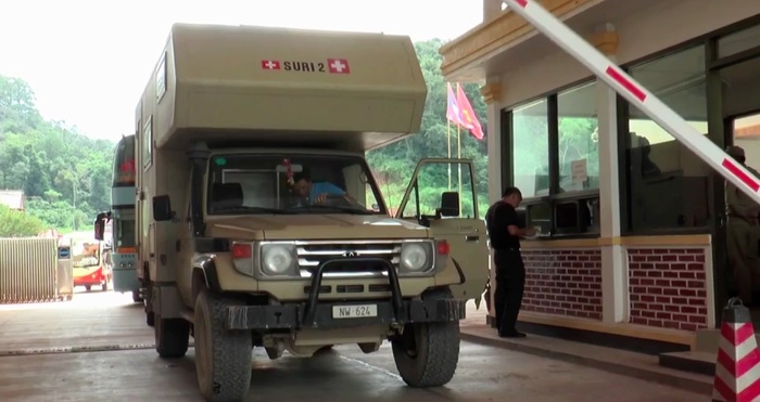 Border check point on the Lao PDR side. Video screenshot. http://www.adb.org/results/tourist-influx-helps-rural-lao-pdr-thrive