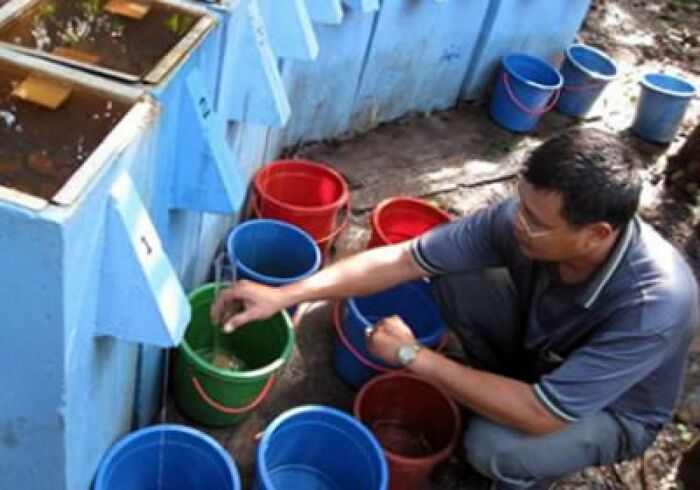 People enjoying the benefits of the water treatment facility. ADB Flickr