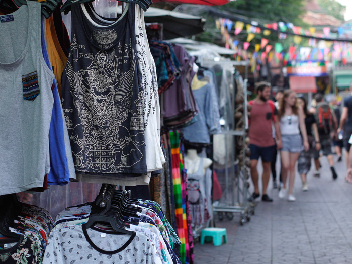 Tourists shop for items at the sprawling street market in Bangkok's Banglamphu district. Centered around Khao San Road, this neighborhood attracts the largest number of foreign tourists in the capital. ADB Flickr